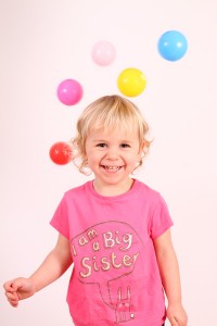 Infant with ball photo